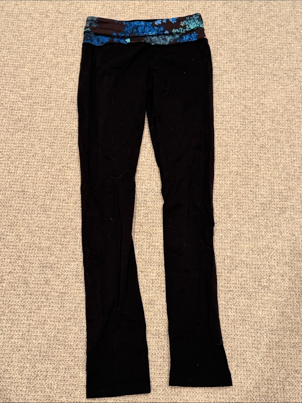 lululemon athletica Black Leggings with Blue Floral Waistband.